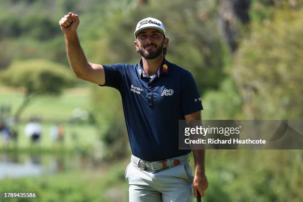 Max Homa of the United States celebrates victory after holing the winning putt on the 18th green during Day Four of the Nedbank Golf Challenge at...