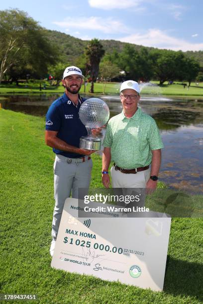 The prize giving ceremony takes place as Max Homa of the United States is awarded the trophy and cheque with Mike Brown of Nedbank after winning the...