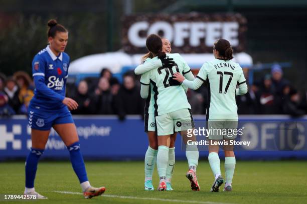Sam Kerr of Chelsea celebrates with teammates Johanna Rytting Kaneryd and Jessie Fleming after scoring the team's second goal during the Barclays...