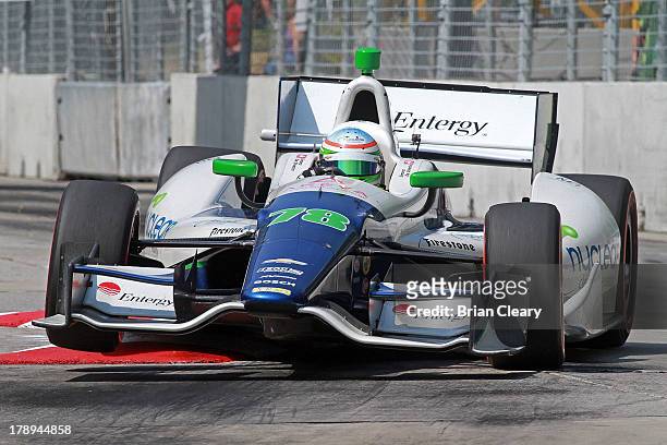 Simona De Silvestro, of Switzerland, driver of the KV Racing Technology Chevrolet Dallara races through a turn during qualifying for the Grand Prix...