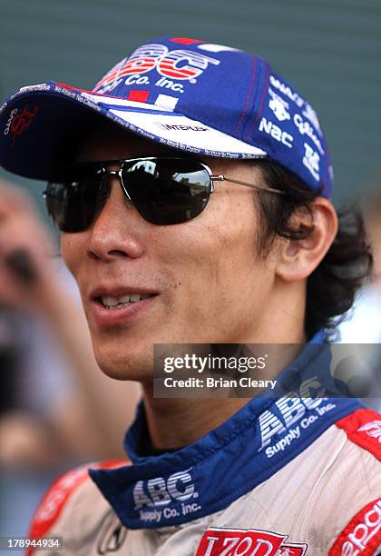 Takuma Sato, of Japan, driver of the A.J. Foyt Enterprises Honda Dallara smiles after qualifying for the Grand Prix of Baltimore on August 31, 2013...