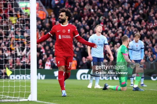 Mohamed Salah of Liverpool celebrates after scoring the team's first goal during the Premier League match between Liverpool FC and Brentford FC at...