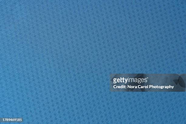 micro mesh jersey fabric blue colors - sports jersey background stock pictures, royalty-free photos & images