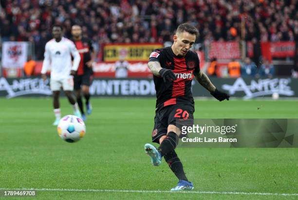 Alex Grimaldo of Bayer Leverkusen scores the team's first goal during the Bundesliga match between Bayer 04 Leverkusen and 1. FC Union Berlin at...