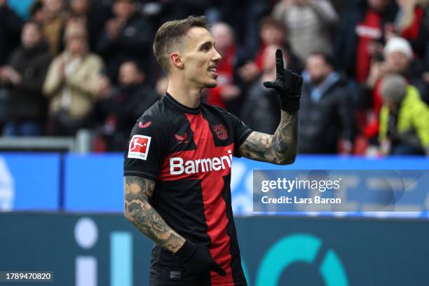 Alex Grimaldo of Bayer Leverkusen celebrates after scoring the team's first goal during the Bundesliga match between Bayer 04 Leverkusen and 1. FC...