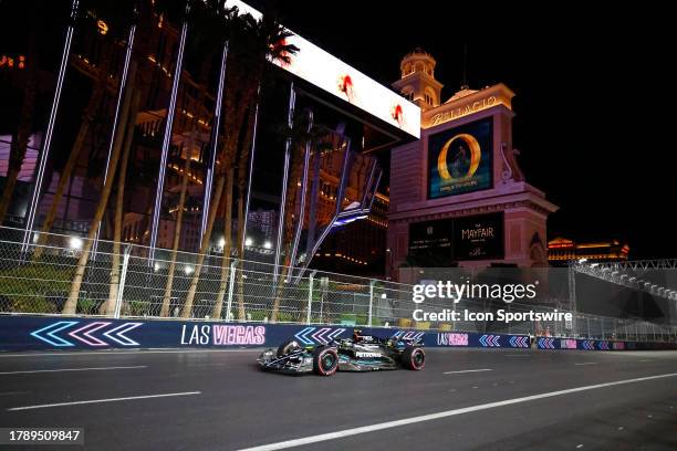 Mercedes driver Lewis Hamilton of United Kingdom races down the strip in front of the Bellagio Resort & Hotel during free practice 3 for the Formula...