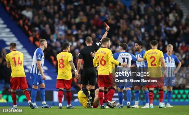 Mahmoud Dahoud of Brighton & Hove Albion receives a red card from referee John Brooks during the Premier League match between Brighton & Hove Albion...