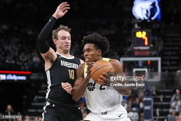 Collin Sexton of the Utah Jazz goes to the basket during the game against Luke Kennard of the Memphis Grizzlies at FedExForum on November 10, 2023 in...