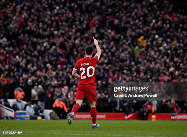 Diogo Jota of Liverpool celebrates after scoring the third goal making the score 3-0 during the Premier League match between Liverpool FC and...