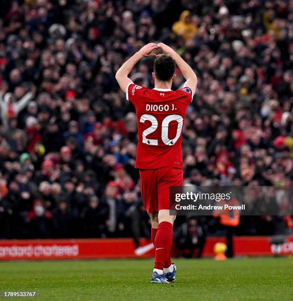 Diogo Jota of Liverpool celebrates after scoring the third goal making the score 3-0 during the Premier League match between Liverpool FC and...