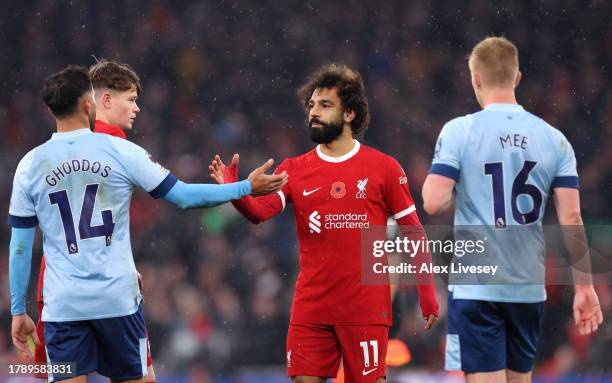 Mohamed Salah of Liverpool shakes hands with Saman Ghoddos of Brentford following the Premier League match between Liverpool FC and Brentford FC at...