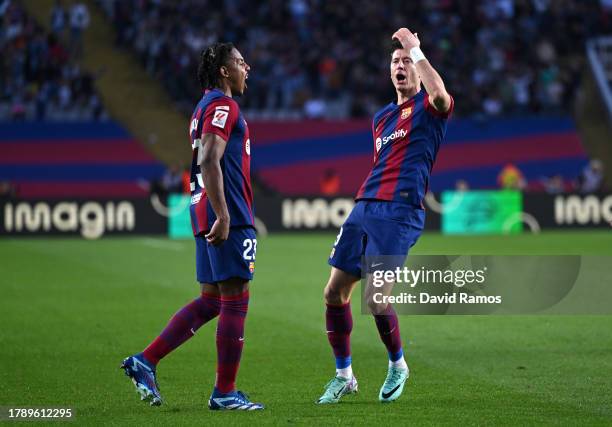 Robert Lewandowski of FC Barcelona celebrates with teammate fcb23after scoring the team's first goal during the LaLiga EA Sports match between FC...