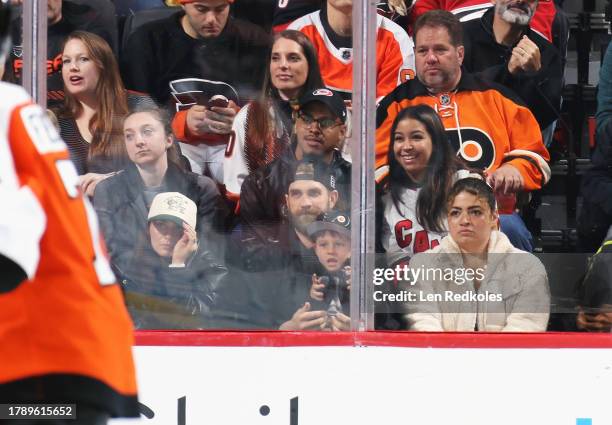 Bryce Haper of the Philadelphia Phillies, his wife Kayla and son Krew attend an NHL game between the Philadelphia Flyers and the Carolina Hurricanes...