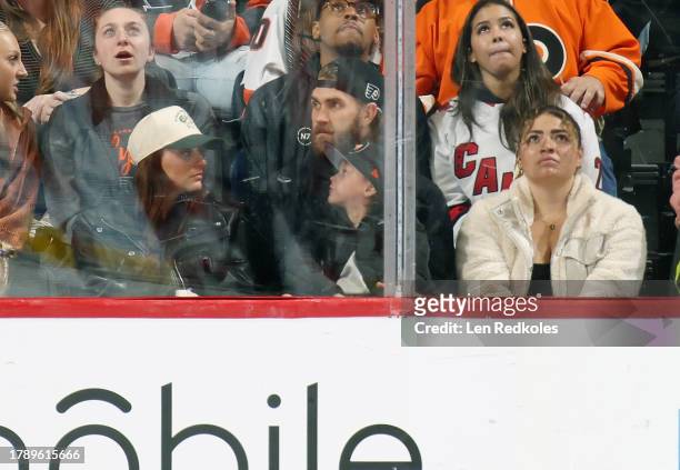 Bryce Haper of the Philadelphia Phillies, his wife Kayla and son Krew attend an NHL game between the Philadelphia Flyers and the Carolina Hurricanes...