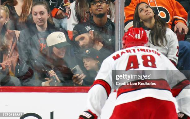 Bryce Haper of the Philadelphia Phillies, his wife Kayla and son Krew attend an NHL game between the Philadelphia Flyers and the Carolina Hurricanes...