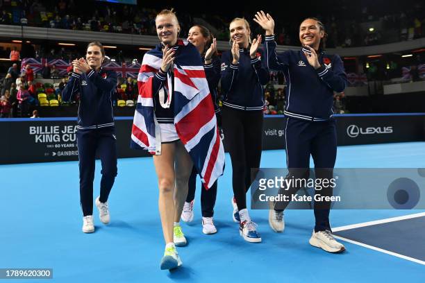 Maia Lumsden, Harriet Dart, Jodie Burrage, Katie Boulter and Heather Watson of Great Britain pose for a photo after the team's victory during day 2...