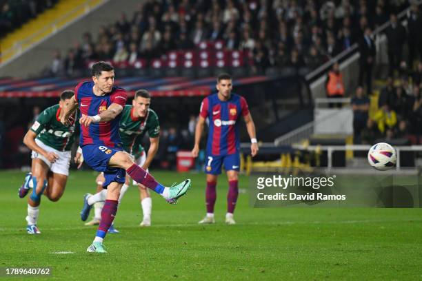 Robert Lewandowski of FC Barcelona scores the team's second goal from a penalty during the LaLiga EA Sports match between FC Barcelona and Deportivo...