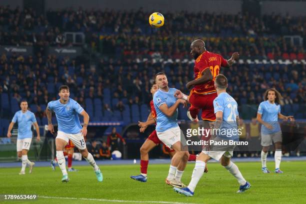 Romelu Lukaku of AS Roma heads the ball under pressure from Patric of SS Lazio during the Serie A TIM match between SS Lazio and AS Roma at Stadio...