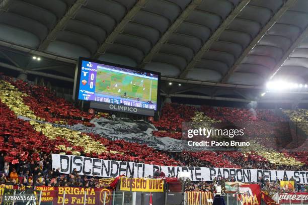 Fans of AS Roma display a tifo during the Serie A TIM match between SS Lazio and AS Roma at Stadio Olimpico on November 12, 2023 in Rome, Italy.