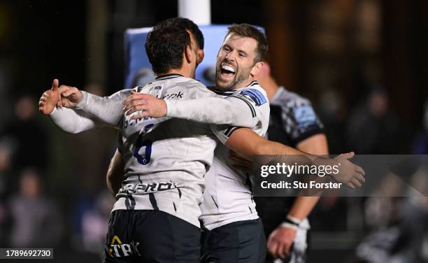 Saracens try scorer Juan-Martin Gonzalez is congratulated by Elliot Daly after scoring the sixth Saracens try during the Gallagher Premiership Rugby...