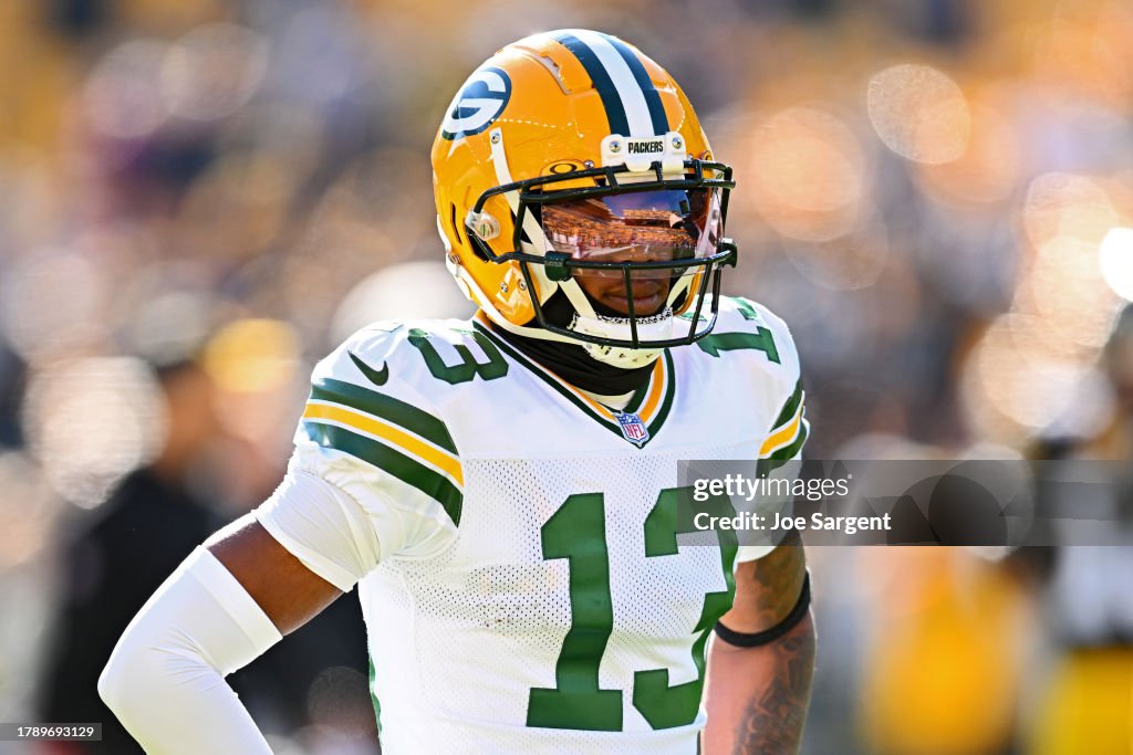 Dontayvion Wicks of the Green Bay Packers looks on prior to a game