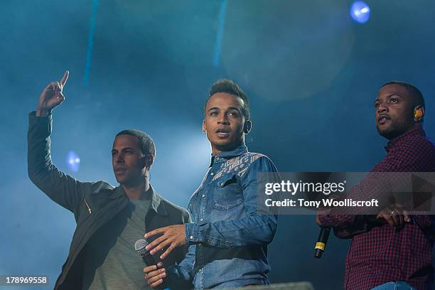 Marvin Humes, Aston Merrygold and JB Gill of JLS perform at the Fusion Festival at Cofton Park on August 31, 2013 in Birmingham, England.