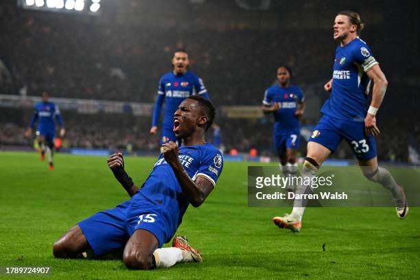 Nicolas Jackson of Chelsea celebrates after scoring the team's third goal during the Premier League match between Chelsea FC and Manchester City at...
