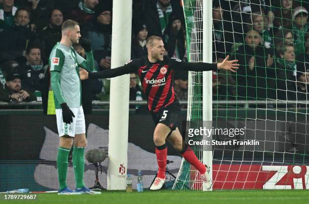Manuel Gulde of Sport-Club Freiburg celebrates after scoring the team's second goal during the Bundesliga match between SV Werder Bremen and...