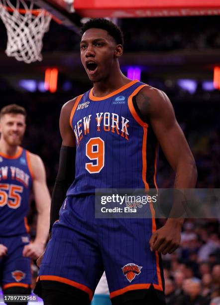 Barrett of the New York Knicks celebrates after he drew the foul during the first half against the Charlotte Hornets at Madison Square Garden on...