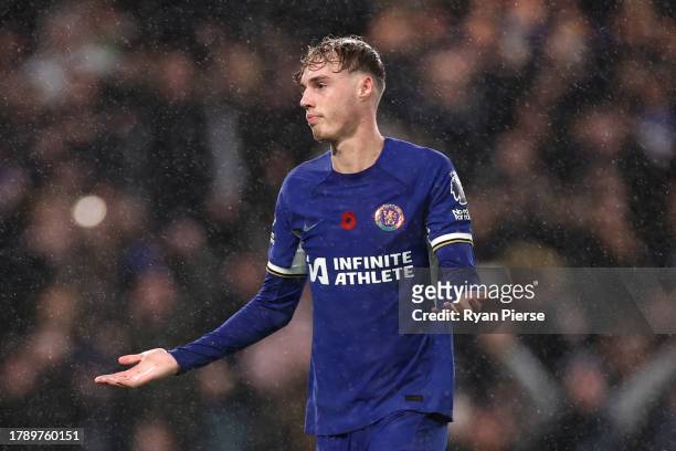 Cole Palmer of Chelsea celebrates after scoring the team's fourth goal from a penalty during the Premier League match between Chelsea FC and...