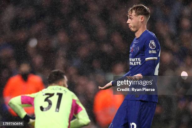 Cole Palmer of Chelsea celebrates after scoring the team's fourth goal from a penalty during the Premier League match between Chelsea FC and...