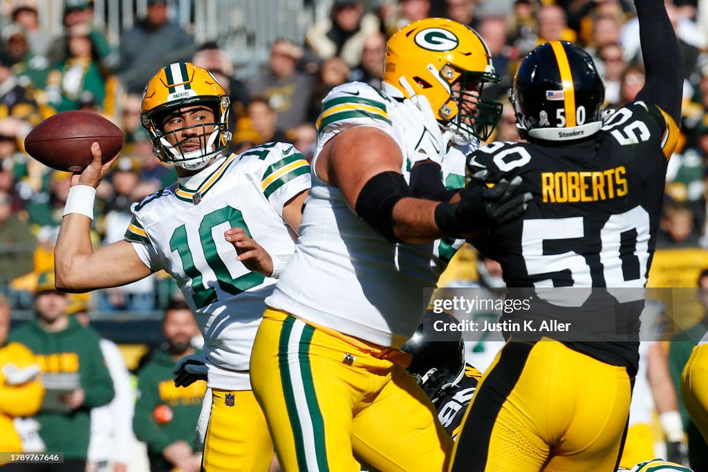 Jordan Love of the Green Bay Packers attempts a pass during the first