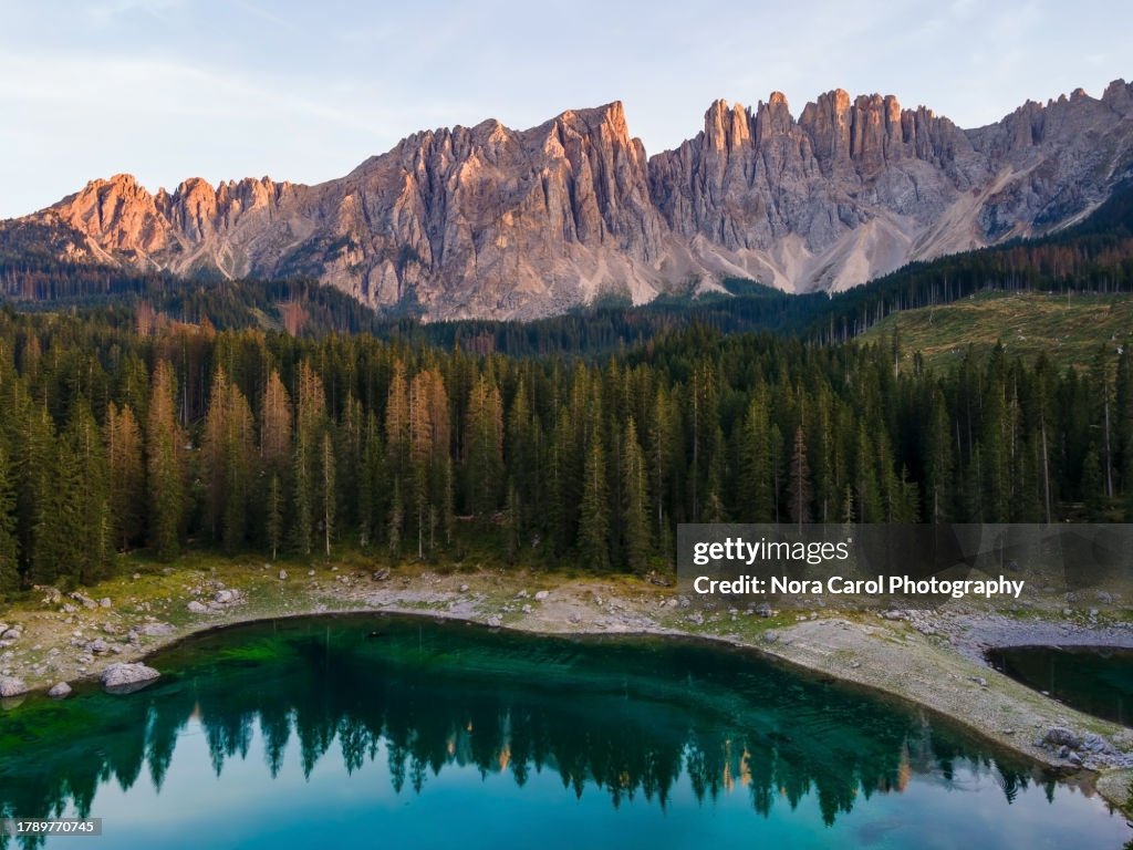Sunset Over Lake Carezza Karersee and Latemar Massif in Dolomites