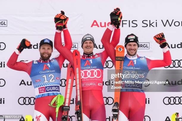 Marco Schwarz of Team Austria takes 2nd place, Manuel Feller of Team Austria takes 1st place, Mario Matt of Team Austria takes 3rd place during the...