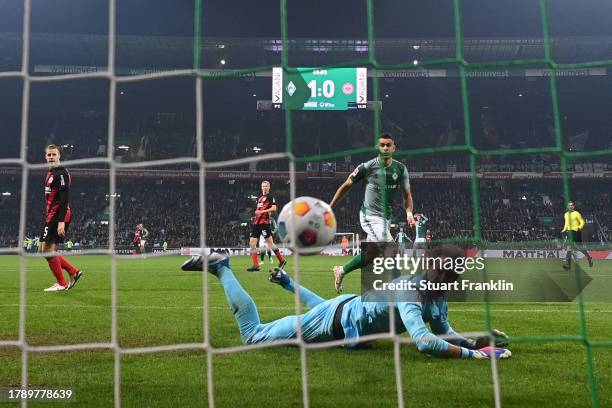 Rafael Santos Borre of Werder Bremen scores the team's second goal during the Bundesliga match between SV Werder Bremen and Eintracht Frankfurt at...