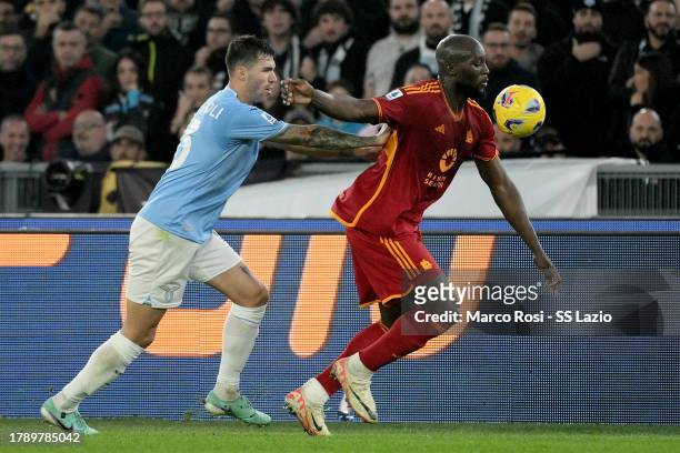 Alessio Romagnoli of SS Lazio compete for the ball with Romelu Lukaku of AS Roma during the Serie A TIM match between SS Lazio and AS Roma at Stadio...