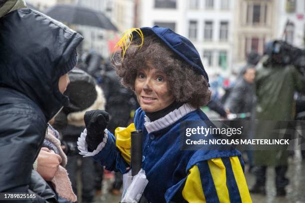 Illustration picture shows a soot Piet during the arrival of Sinterklaas in Antwerp, Saturday 18 November 2023. Sinterklaas is a tradition, mostly...