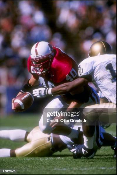 Fullback Jon Ritchie of the Stanford Cardinal carries the ball and ...
