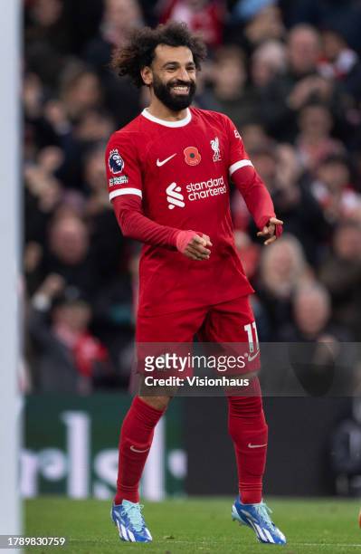 Mohamed Salah of Liverpool celebrates scoring during the Premier League match between Liverpool FC and Brentford FC at Anfield on November 12, 2023...