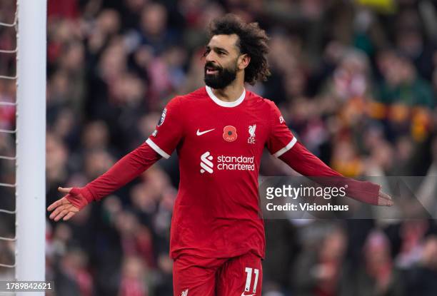Mohamed Salah of Liverpool celebrates scoring during the Premier League match between Liverpool FC and Brentford FC at Anfield on November 12, 2023...