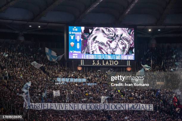 The SS Lazio supporters display a banner dedicated to Gabriele Sandri during the Serie A TIM match between SS Lazio and AS Roma at Stadio Olimpico on...