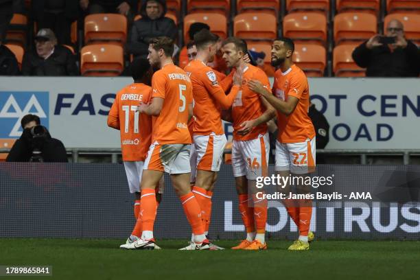 Jordan Rhodes of Blackpool celebrates with his team mates after scoring a goal to make it 1-0 during the Sky Bet League One match between Blackpool...