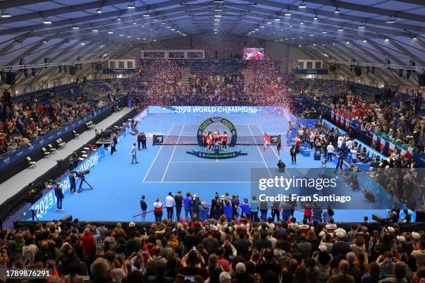 Players of Team Canada lift the trophy after winning the Billie Jean King Cup Final match between Canada and Italy at Estadio de La Cartuja on...