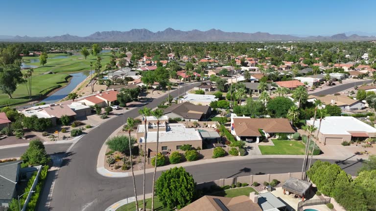 https://media.gettyimages.com/id/1789884784/video/southwest-usa-country-club-neighborhood-aerial-establishing-shot-with-houses-homes-and-palm.jpg?b=1&s=640x640&k=20&c=mgVc0d8Zoj3aWQj1mbVDS2XKIpP6Rj4FxoiiqhSPzWI=