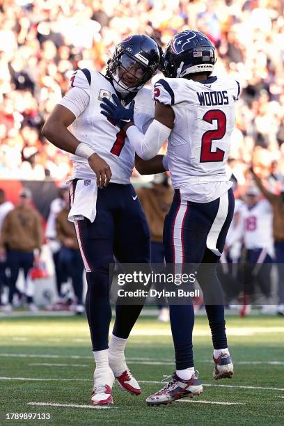 Stroud and Robert Woods of the Houston Texans celebrate after a touchdown during the third quarter against the Cincinnati Bengals at Paycor Stadium...