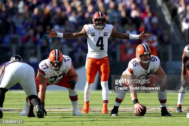 Deshaun Watson of the Cleveland Browns motions at the line of scrimmage against the Baltimore Ravens during the second quarter at M&T Bank Stadium on...