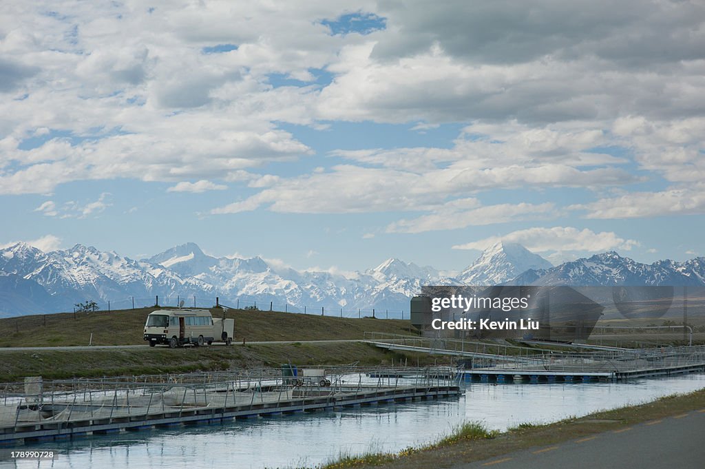 A truck stopping next to salmon farm