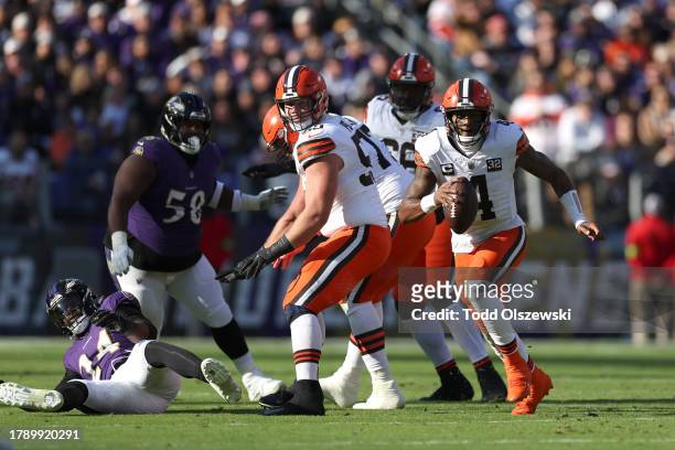 Deshaun Watson of the Cleveland Browns runs the ball against the Baltimore Ravens during the first half at M&T Bank Stadium on November 12, 2023 in...