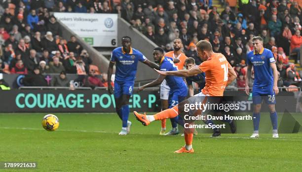 Blackpool's Jordan Rhodes scores his team's first goal during the Sky Bet League One match between Blackpool and Shrewsbury Town at Bloomfield Road...