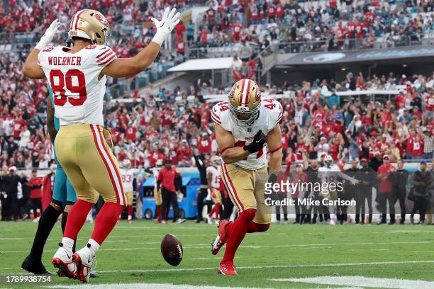 Kyle Juszczyk of the San Francisco 49ers celebrates a touchdown during the fourth quarter against the Jacksonville Jaguars at EverBank Stadium on...